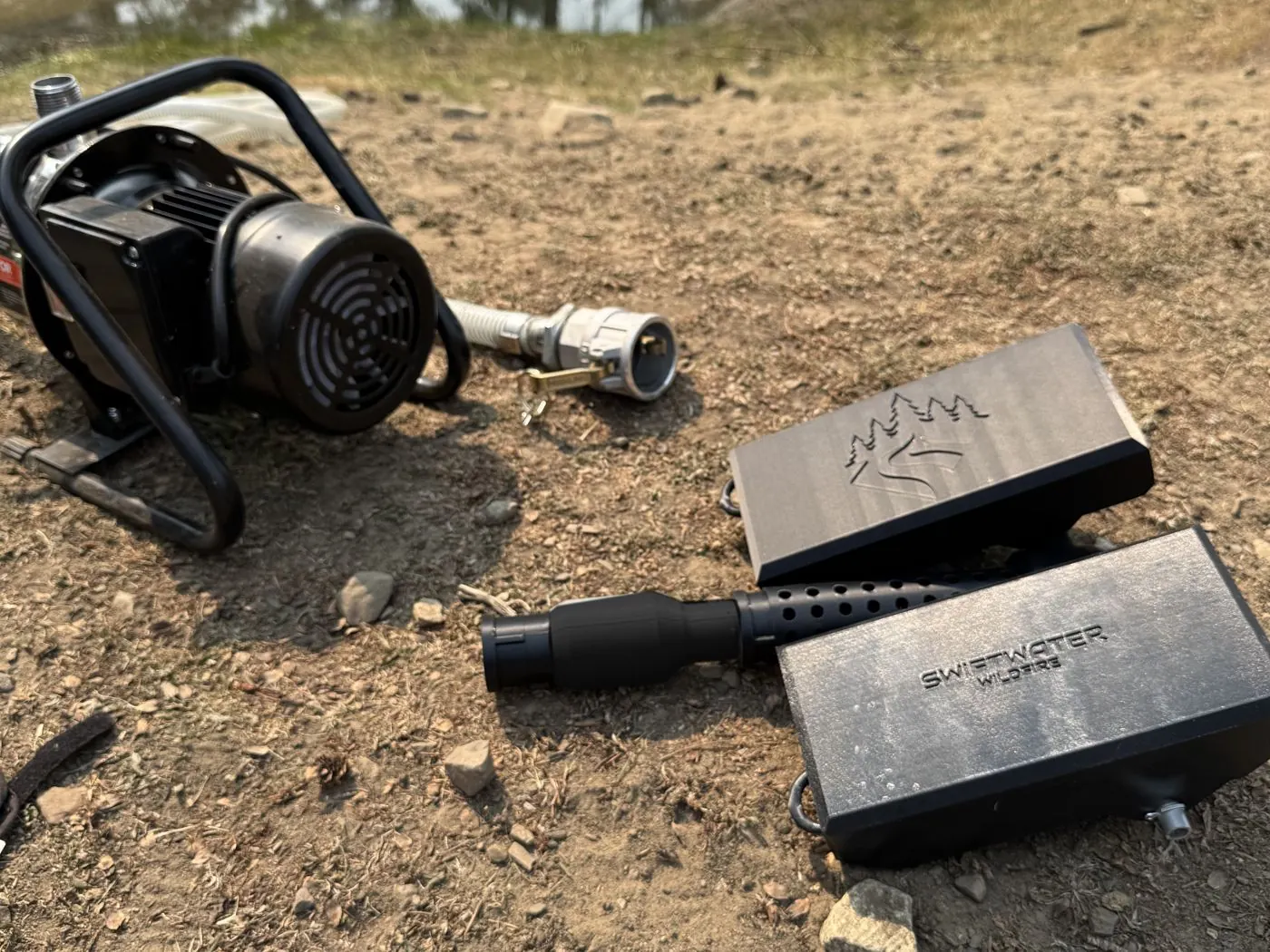 1-inch float intake beside an electric irrigation pump at a pond